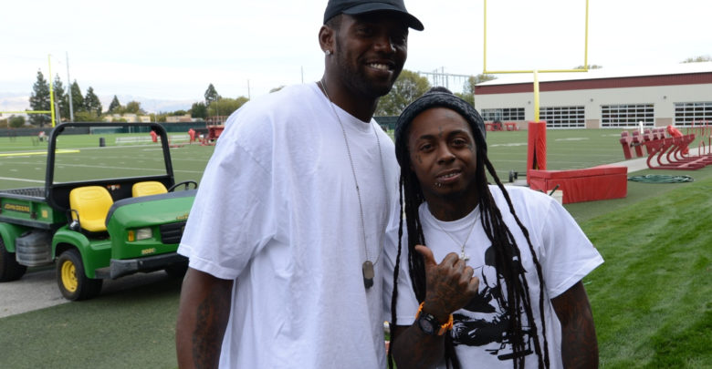 Photo of Icon to Icon: Rapper Lil Wayne interviews 49ers star Randy Moss for Sunday NFL Countdown