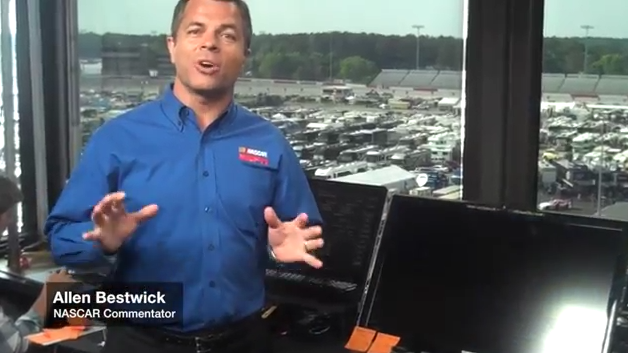Photo of Anchor Allen Bestwick provides a tour of ESPN NASCAR booth equipment