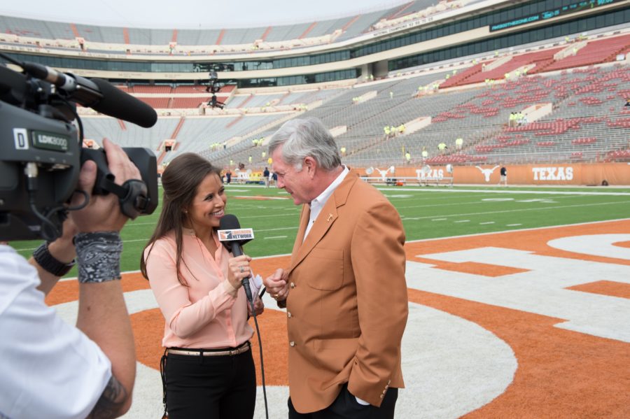Now ESPN colleagues working on the New Orleans Bowl together, sideline reporter Kaylee Hartung and then-Texas  head coach Mack Brown previously were regulars on the Longhorn Network. (Scott Clarke/ESPN Image)