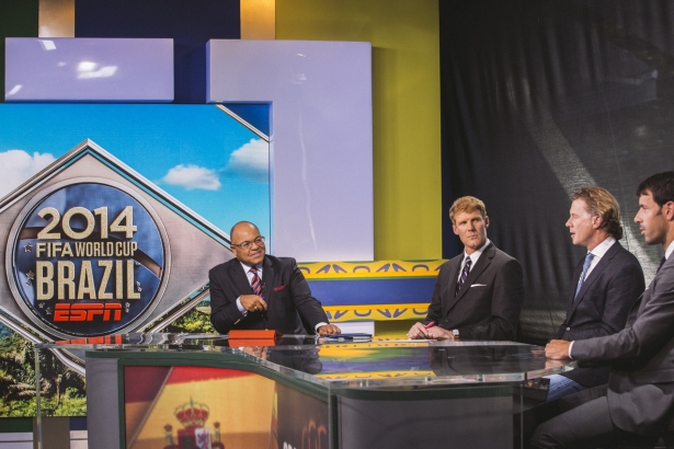 (L-R) Mike Tirico, Alexi Lalas and Steve McManaman on set in Brazil during the 2014 FIFA World Cup. (Gabriela Batista/ESPN Images)