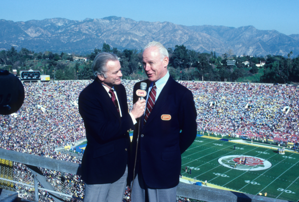 Jim Simpson (left) and Bud Wilkinson are shown commentating at the 1983 Rose Bowl. (Long Photography)