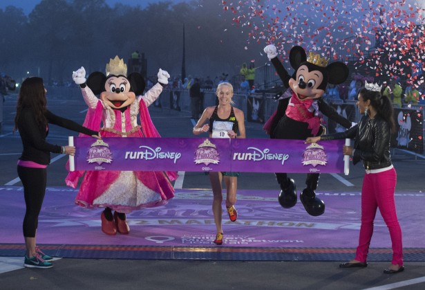 Kim Smith, 32, of Providence, RI, shattered the Disney Princess Half Marathon record with a time of 1:11:49 on Sunday, Feb. 23, 2014. Smith, a three-time Olympian, crossed the finish line nearly 15 minutes ahead of the next finisher. (Preston Mack/WDW Photo)