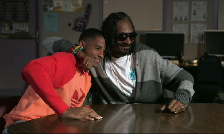 Cordell Broadus with his father Snoop Dogg in a scene of their ESPN mini-series Snoop & Son. 