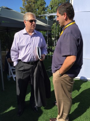 Coordinating producer Mike Cambareri (r) with NFL analyst Chris Mortensen at the NFL owners meetings in Phoenix.  (Jess Kraus/ESPN)