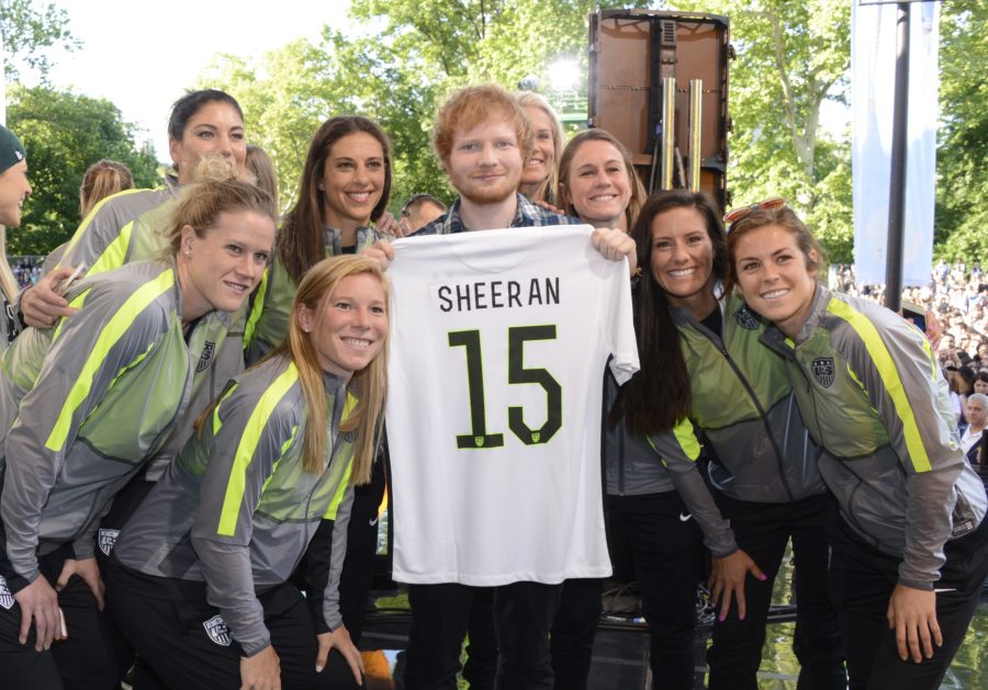 Singer Ed Sheeran posed with members of Team USA on the Good Morning America Concert Series set in New York City. (Ida Mae Astute/ABC)  