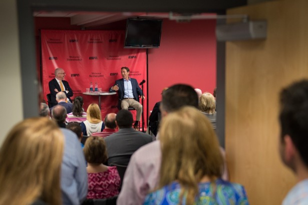 Employees peer in as former ESPN President George Bodenheimer (R) and current ESPN President John Skipper speak to an overflow crowd of employees. (Rich Arden/ESPN Images)