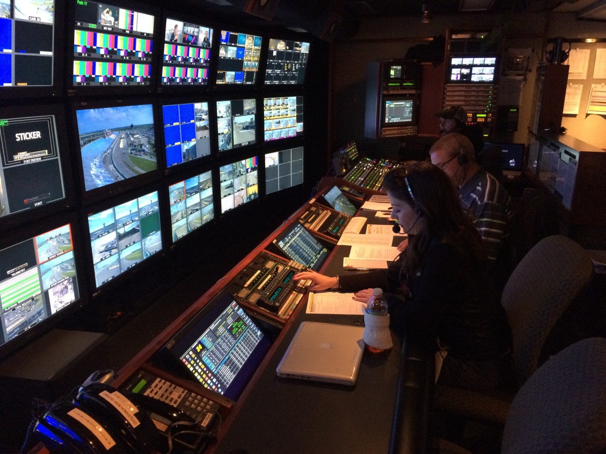 Kate Jackson (foreground) at work in an ESPN mobile control unit while producing a NASCAR telecast in 2014 with director Richie Basile. (Andy Hall/ESPN)