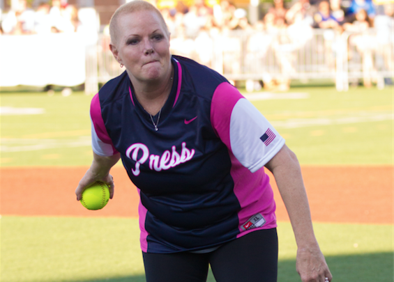 Photo of Shelley Smith throws first pitch at Congressional Women’s Softball Game