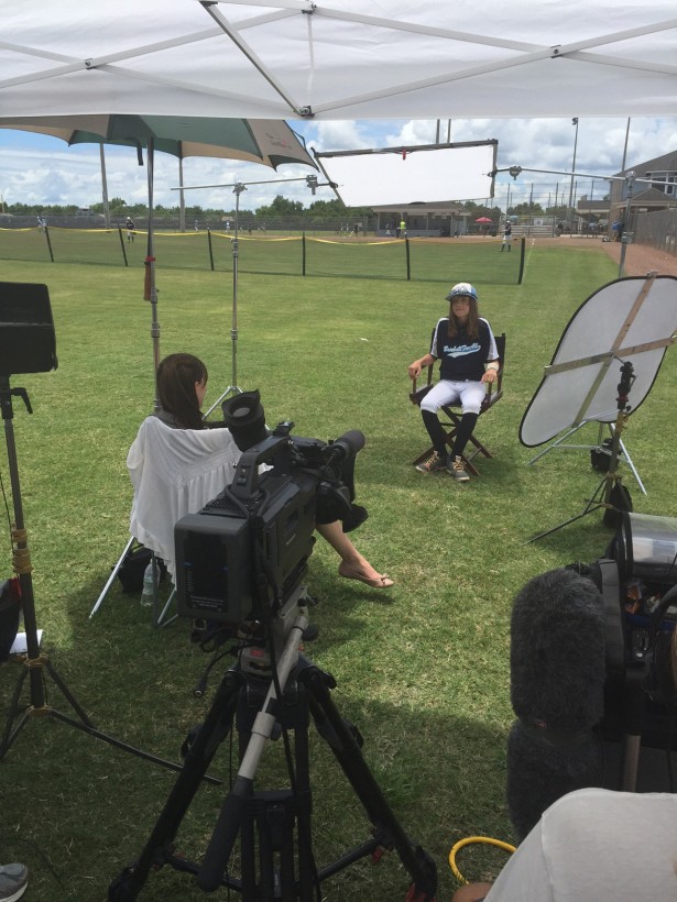 SportsCenter producer Jessica Shobar conducting an interview with a player at America's first national baseball tournament for 10-13-year-old girls. (Photo  courtesy Karen DeVinney)