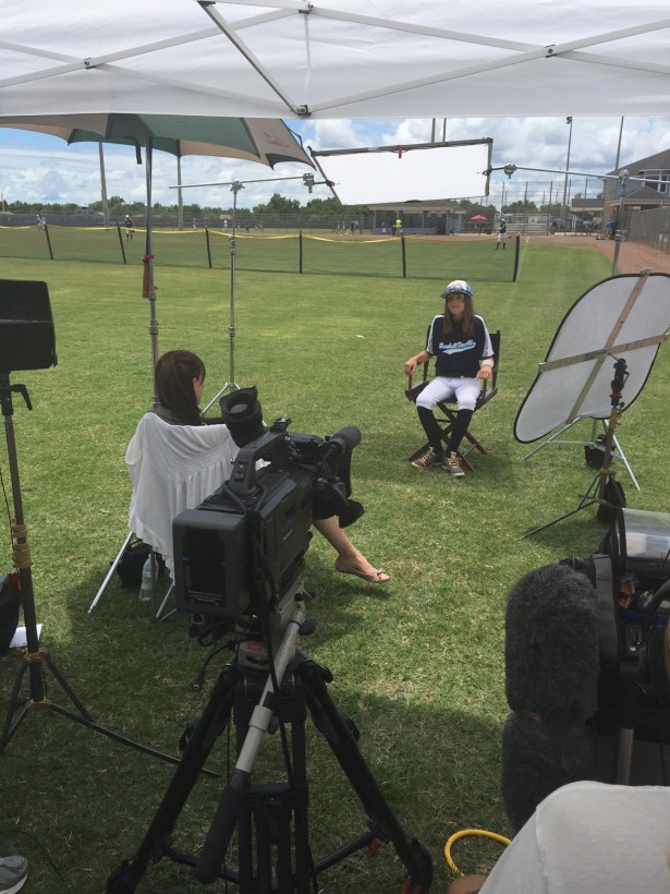 SportsCenter producer Jessica Shobar conducting an interview with a player at America's first national baseball tournament for 10-13-year-old girls. (Photo courtesy Karen DeVinney)
