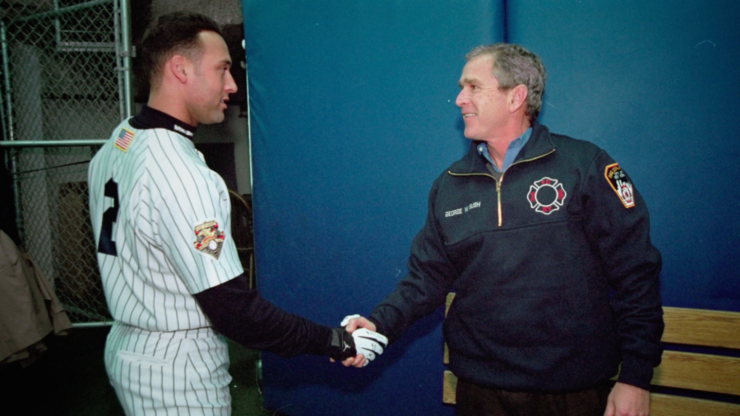 New York Yankees shortstop Derek Jeter (left) greets President George W. Bush before Game 3 of the 2001 World Series. (ESPN Films)