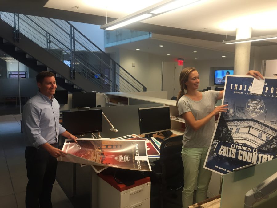 Marcus Lynam, associate marketing manager, and Claire Miller, marketing coordinator, worked on the Monday Night Football poster initiative. (Photo courtesy Marcus Lynam)