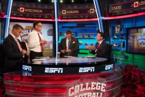 A look at Studio G before its transformation: (L to R) From December 2014, ESPN analysts Brock Huard, and Ed Cunningham, studio host Chris Cotter and UConn football coach Bob Diaco on the set of College Football Live.  (Rich Arden/ESPN Images)