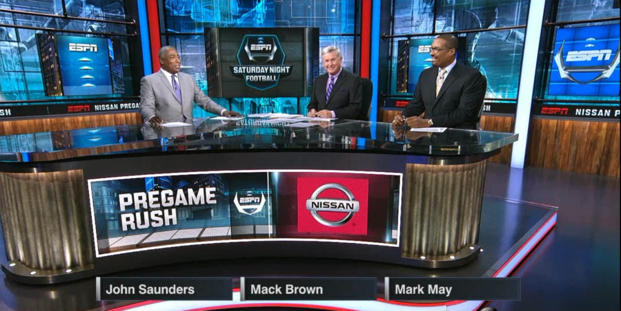 From the redesigned Studio G set this past Saturday, (L-R) host John Saunders joined analysts Mack Brown and Mark May for Saturday’s ABC studio college football coverage. 