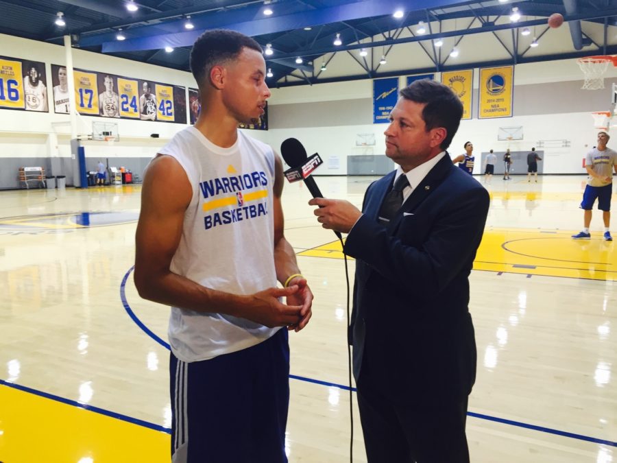 ESPN NBA Insider Marc Stein, interviewing Warriors star Steph Curry here, was embedded with the team during the bulk of its season-opening 24-game winning streak. (Mark Stein/ESPN)