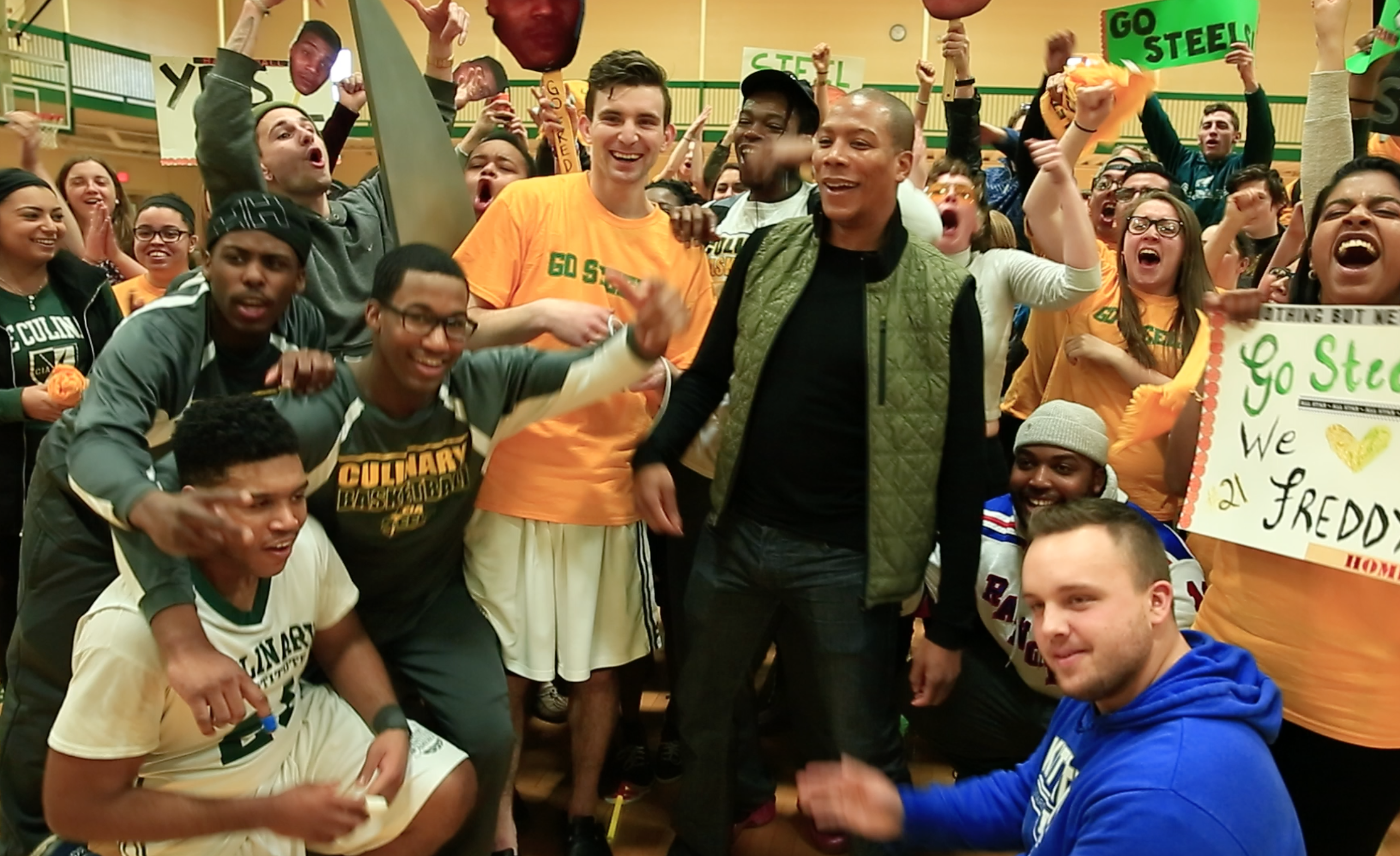 Reese Waters with the Culinary basketball team.