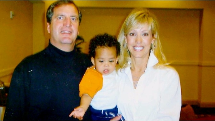 Peggy and Gregg Nibert hold Marcus, the first child fostered by the Nibert Family. (Photo courtesy of Peggy Nibert)