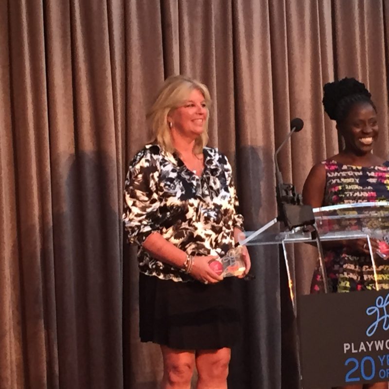 ESPN EVP and CFO Christine Driessen (L) accepts an award, on behalf of ESPN, from Playworks. (Diane Lamb/ESPN)