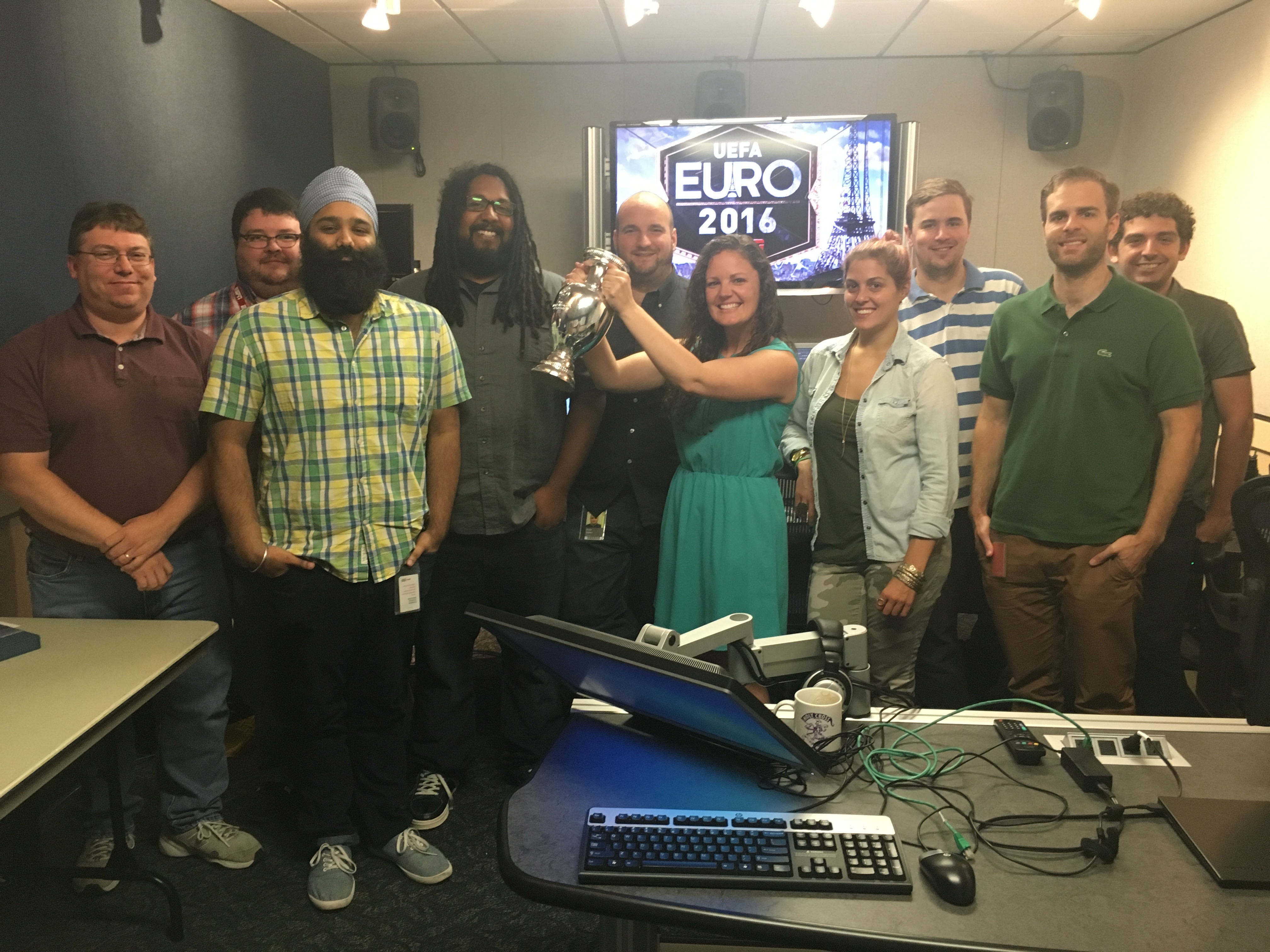 (L-R) Tom Beers, Rob McNicholas, Kartar Singh, Dale Mauldin, Justin Belcher, Tara Baker (center) Meghan Robinson, Lucas Haskins, Brian Arnold, Joshua Vorensky. (Courtesy of Tara Baker)
