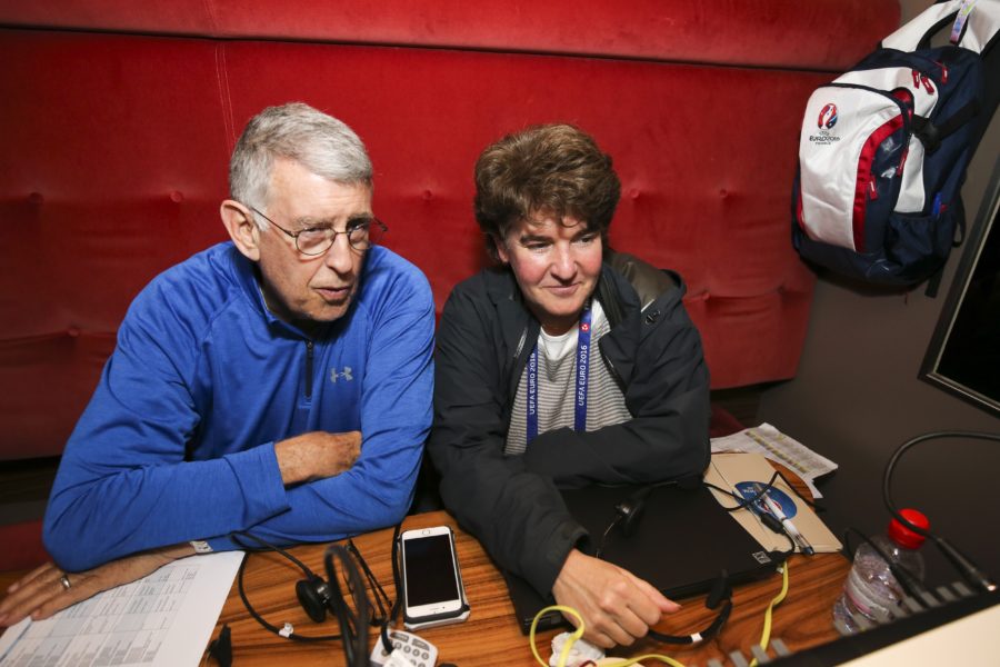 Amy Rosenfeld (right), senior coordinating producer and head of production for UEFA EURO 2016 on ESPN, and senior production specialist Geoffrey Mason, a longtime,  highly accomplished sports television executive, in a remote production truck at ESPN’s host set location along the banks of River Seine in Paris. (Catherine Steenkeste/ESPN Images)