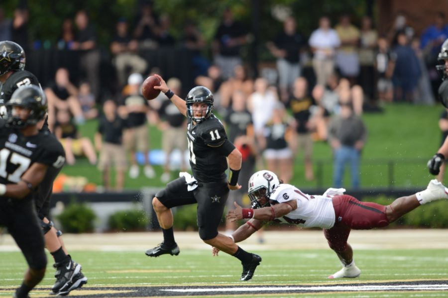 Jordan Rodgers (11), seen here in action from the 2012 season, is a former star quarterback at Vanderbilt (Allen Kee/ESPN Images)