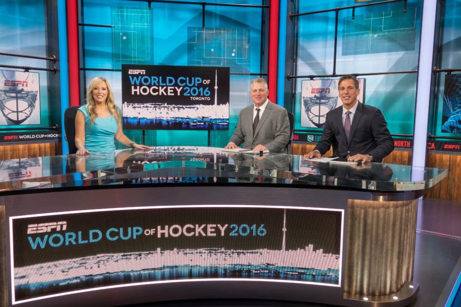 Linda Cohn works with Hall of Famers Brett Hull (center) and Chris Chelios in the WCH studio. (Rich Arden/ESPN)