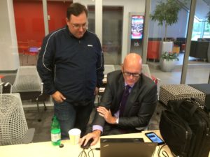 Tom DeCorte (left), producer of the Midnight SportsCenter with Scott Van Pelt, goes over a show plan with Van Pelt. (ESPN/Andy Hall)