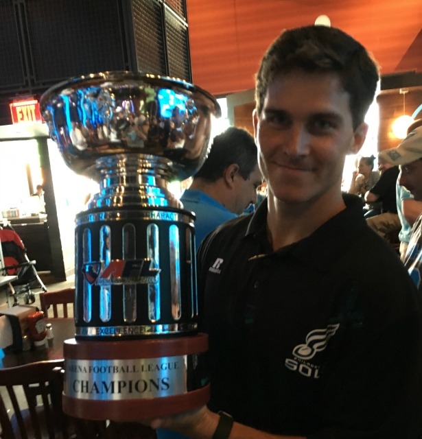Lou Russo holds the Philadelphia Soul's AFL championship trophy. (Photo courtesy of Lou Russo)