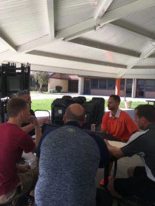 (L-R) Director Tim Sutton, play-by-play commentator Kevin Brown, analyst Craig Haubert and sideline reporter Quint Kessenich interview CSD coach Warren Keller. (Chris Damiani/ESPN)