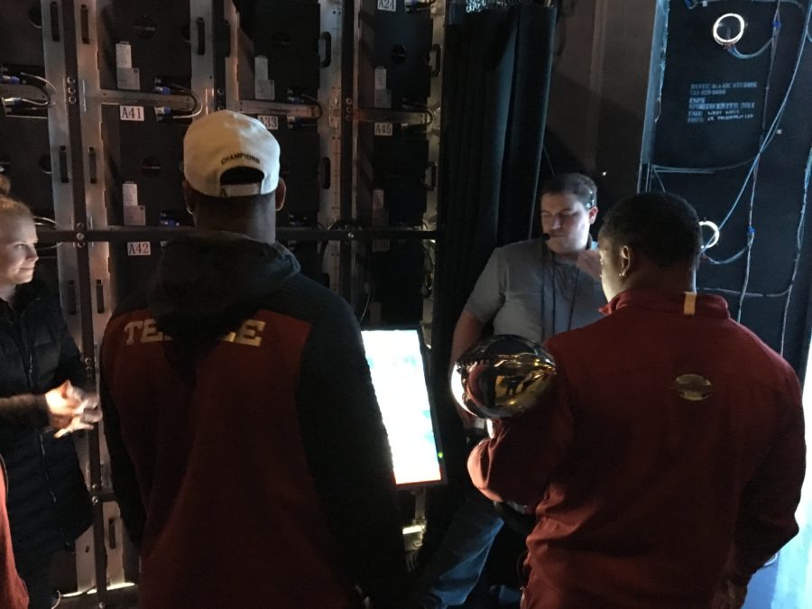 The Owls wait backstage for the cue to surprise Temple alum Kevin Negandhi. (Bethany Karantonis/ESPN)