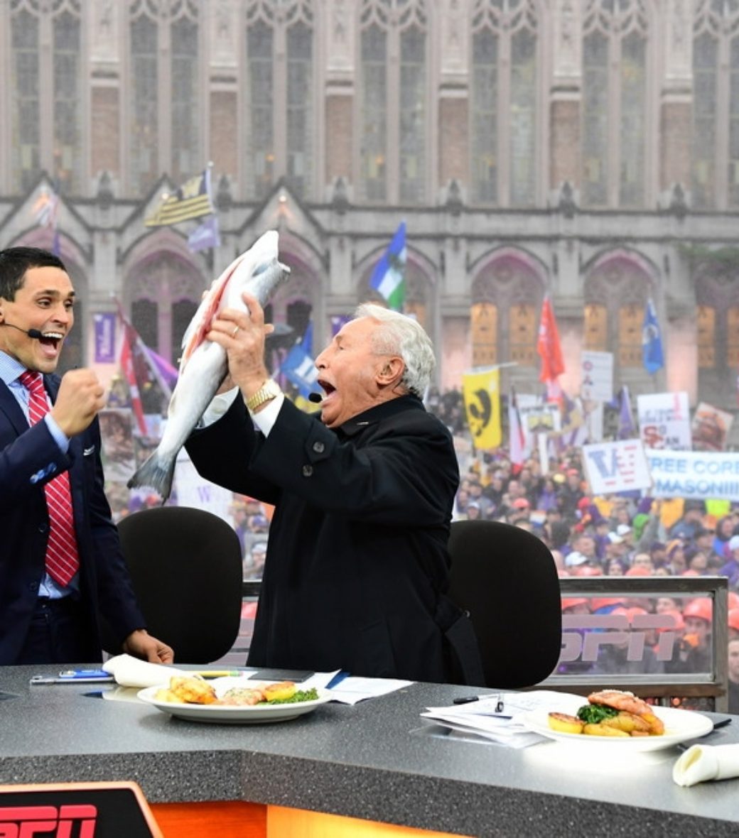 At Washington, David Pollack (L) celebrates Lee Corso catching a fish. (Scott Clarke/ESPN Images)