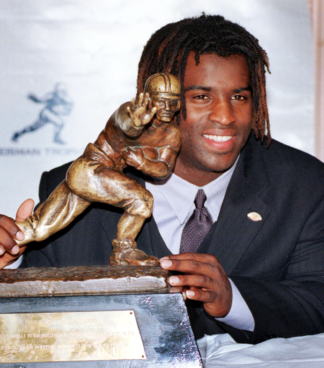 Ricky Williams (1998): In his senior year, Ricky Williams set 21 NCAA records and in 1998, rushed for 2,125 yards with 27 touchdowns. (Courtesy of University of Texas Athletics)