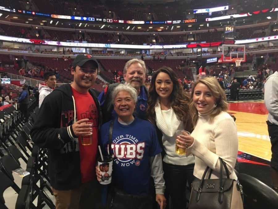 Cassidy Hubbarth (second from right) poses with her family at a Chicago Bulls game. (Photo courtesy of Cassidy Hubbarth/ESPN)