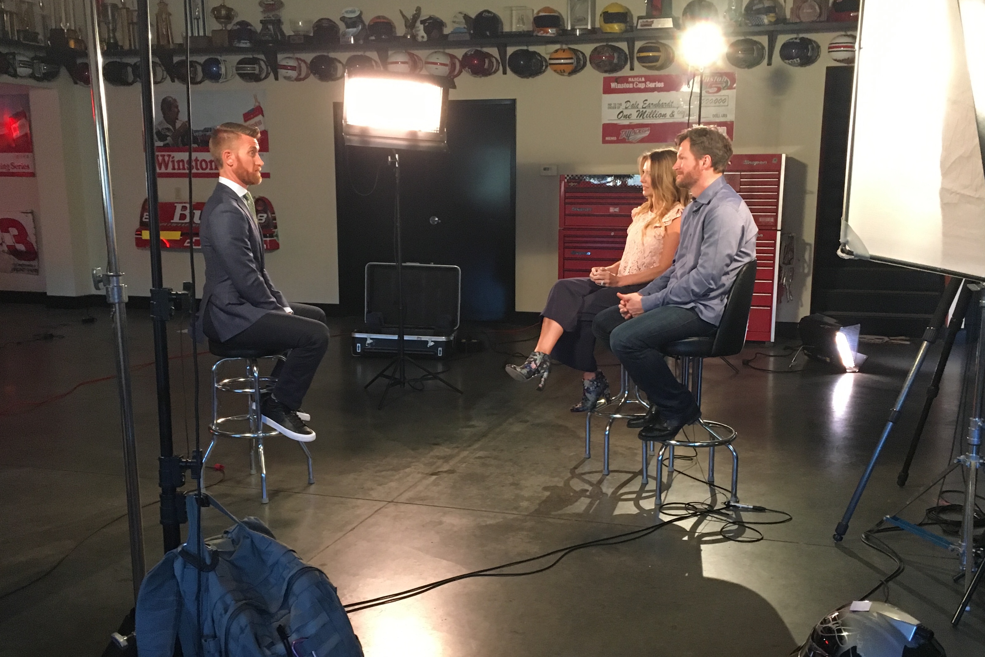 Marty Smith (left) sits down with Dale Earnhardt Jr. and his wife Amy. (Michael O'Connor/ESPN)