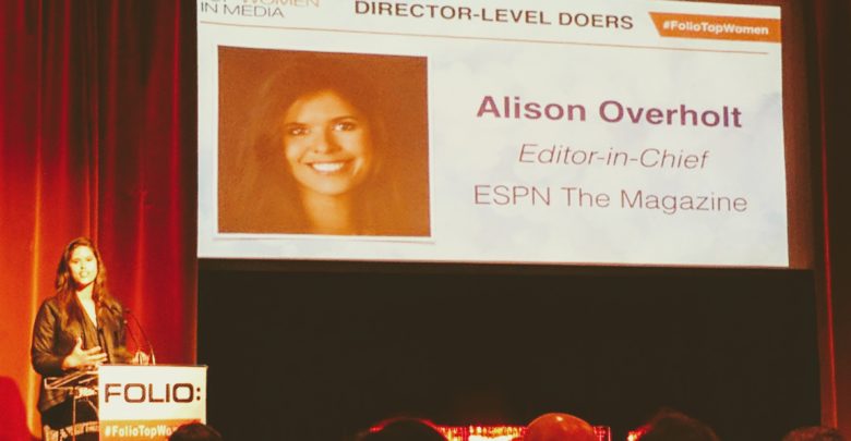 Photo of Alison Overholt accepts awards on behalf of espnW, ESPN The Mag