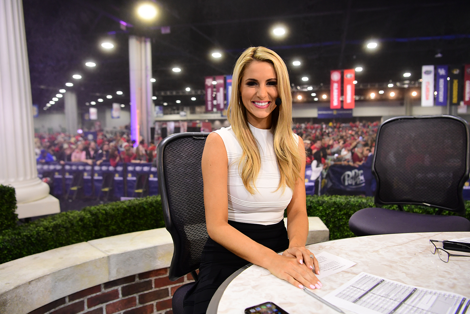 ESPN and SEC Network host/reporter Laura Rutledge is pulling double duty at...