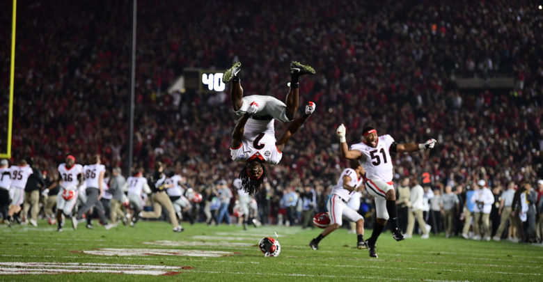 Photo of You’ll Believe (Bull)dogs Can Fly: Saluting College Football 150 With ESPN Images’ Fabulous Photogs