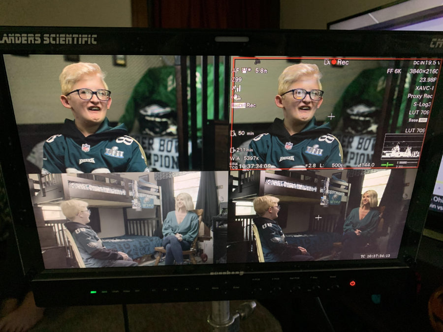 Michelle Beisner-Buck interviews Eagles superfan Giovanni Hamilton. (Miriam Greenfield/ESPN)