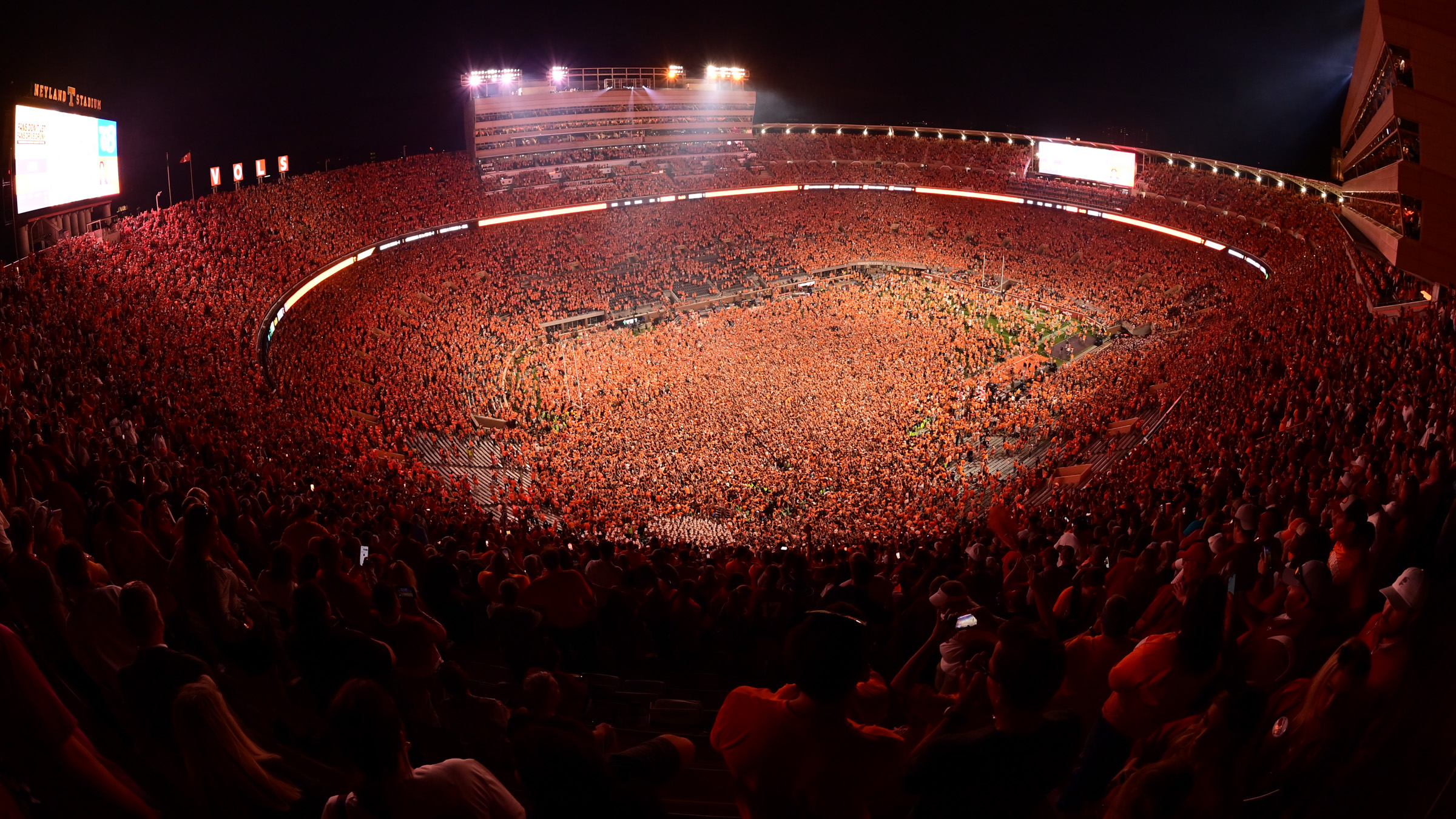 Knoxville, TN - October 15, 2022 - Neyland Stadium: Fans of the Tennessee Volunteers (Vols) storm the field following a regular season game.(Photo by Phil Ellsworth / ESPN Images)