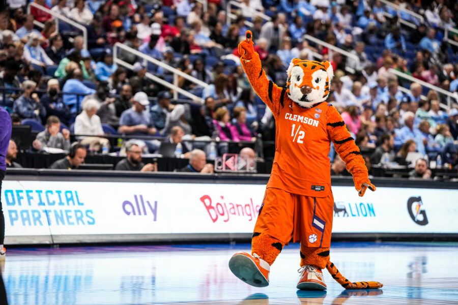 By day, Holland Mickle is Programming Coordinator, ESPN Programming & Acquisitions ACC Network. But Thursday, March 2, during the ACC Women's Basketball Tournament, Mickle returned to her Clemson University mascot roots as an emergency fill in.