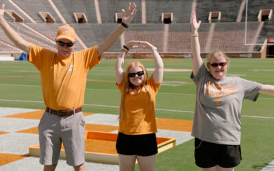 Bailey, center, with her grandfather and mom