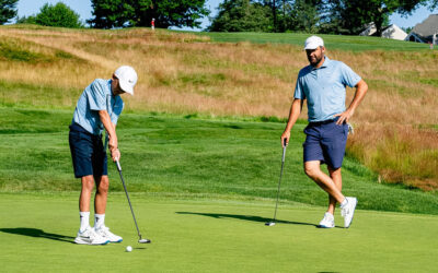 Caleb and Scottie on the green